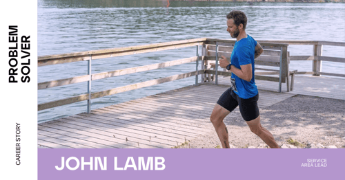 John Lamb is jogging next to a lake.
